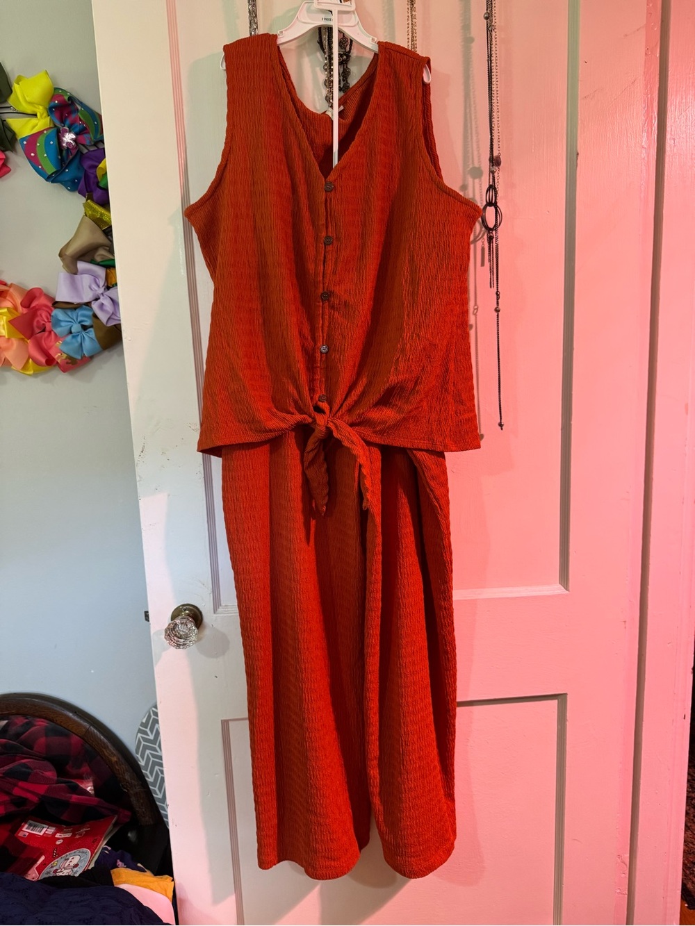 Cato Textured Sleeveless Jumpsuit in Rust Orange